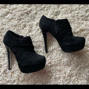Trendy black booties. H by Halston.